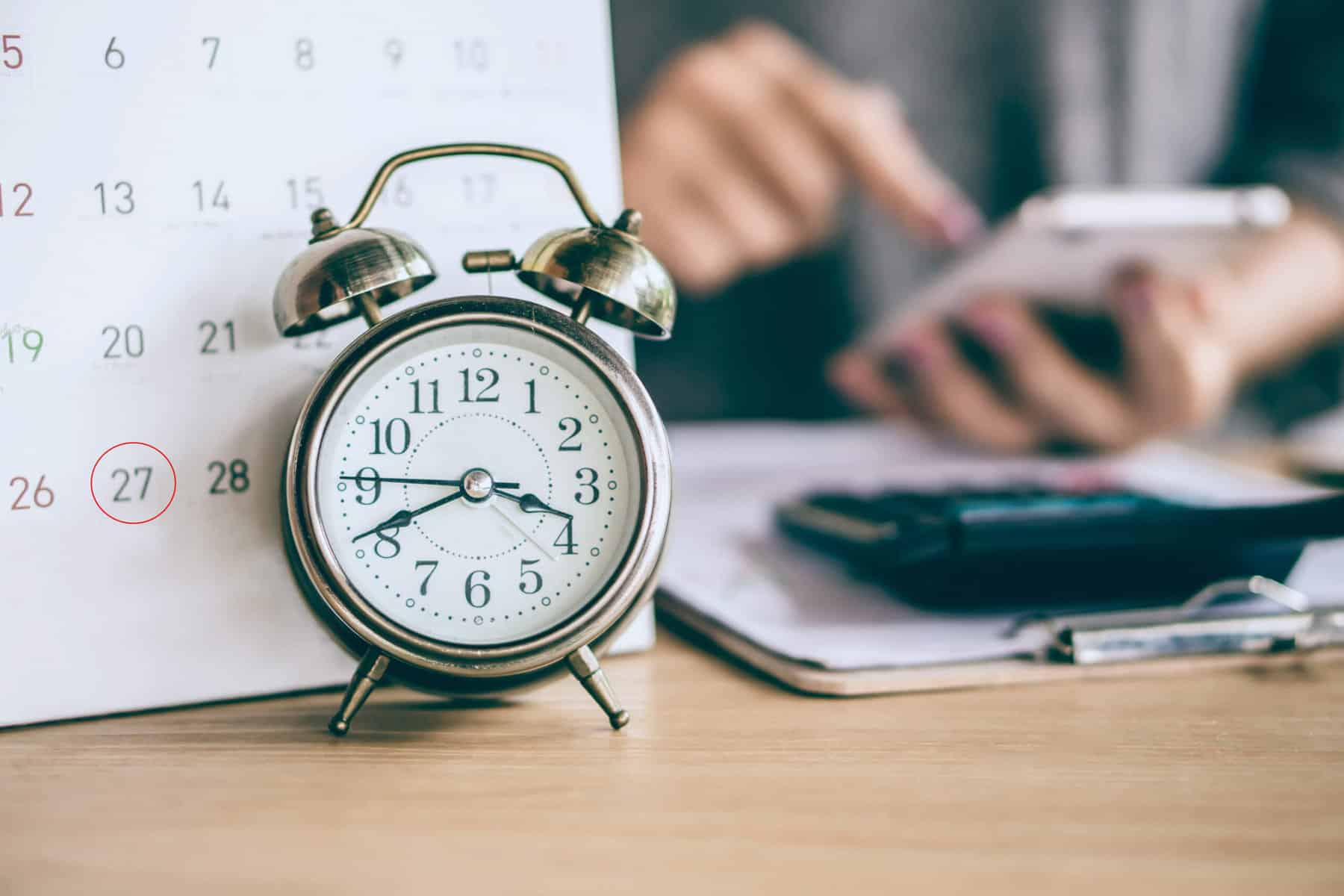 woman calculating expenses due date scaled